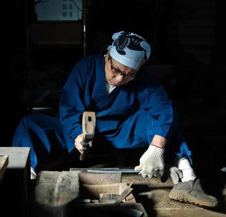 Japanese blacksmith forging knife inspired by Matsato Osuren traditional craftsmanship
