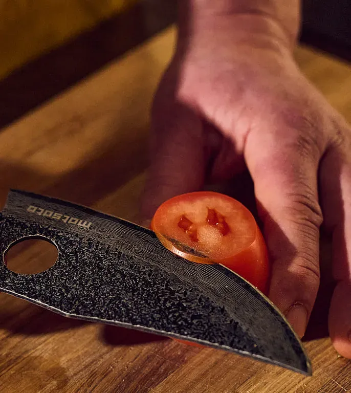 Close-up of the Matsato Osuren handcrafted pakka and acacia wood handle grain detail